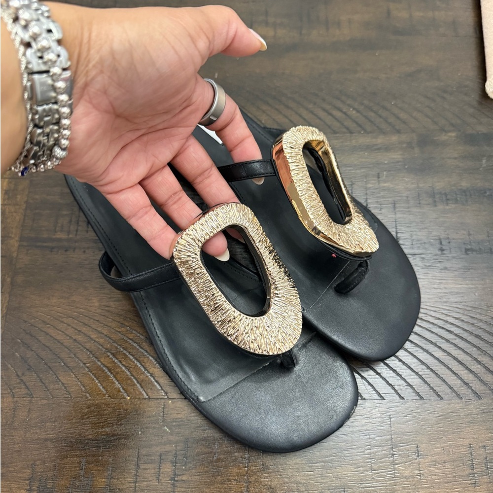 Steve Madden Black Toe-Post Sandals with Textured Gold Oval Hardware